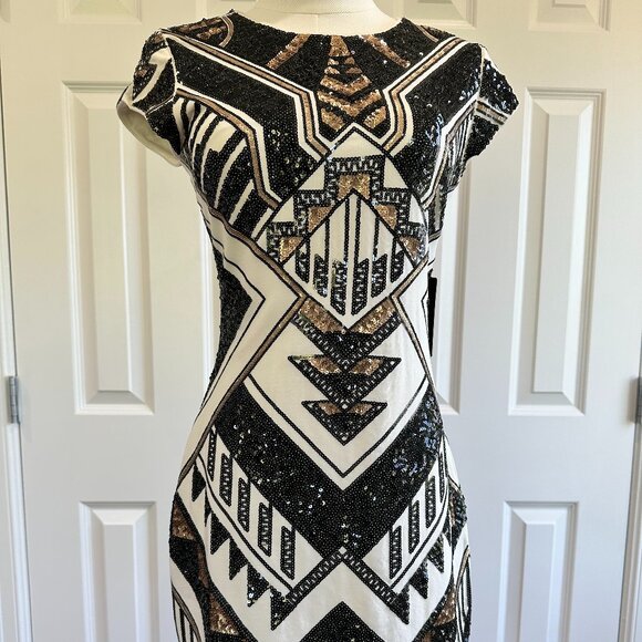 EXPRESS Dresses & Skirts - NWT, EXPRESS, bodycon, geometric black and gold sequined mini dress. Size Medium